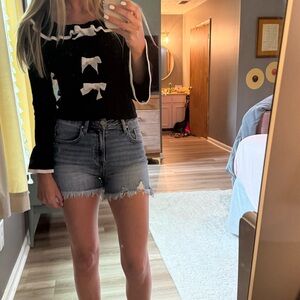 ILLA ILLA Black Sweater Top with White Ruffles